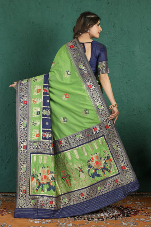 Mahendi green color paithani silk saree with zari weaving work