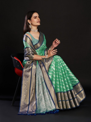 Sea green color kanjivaram silk saree with zari weaving work