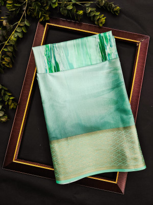 Sea green color satin silk saree with printed work