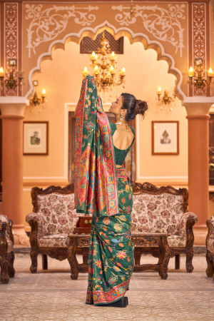 Green color banarasi silk saree with woven design
