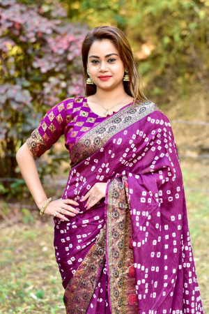 Magenta color hand bandhej bandhani saree with zari weaving work