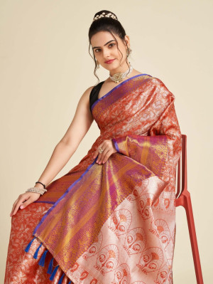 Orange color tissue silk saree with zari weaving work