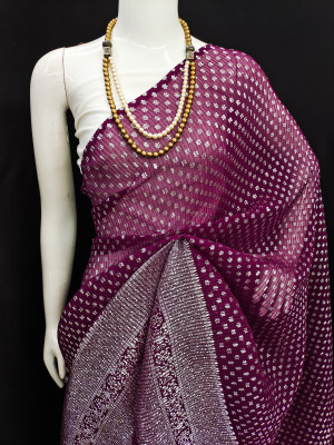 Magenta color soft georgette saree with foil printed work