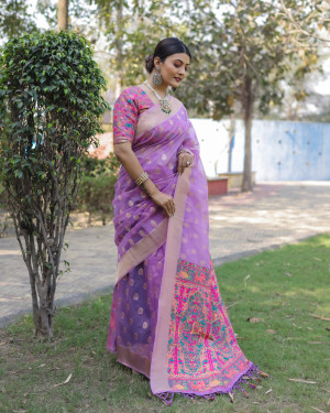 Purple color soft organza silk saree with zari weaving work