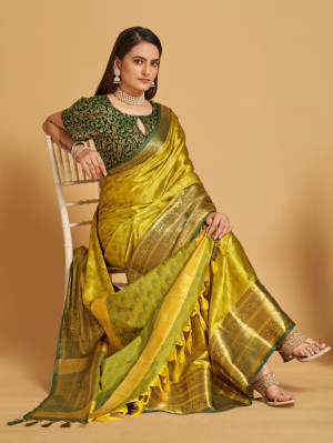 Mahendi green color cotton silk saree with Woven design