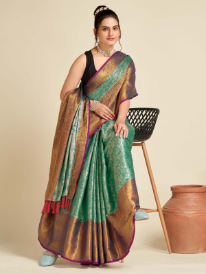 Sea green color tissue silk saree with zari weaving work