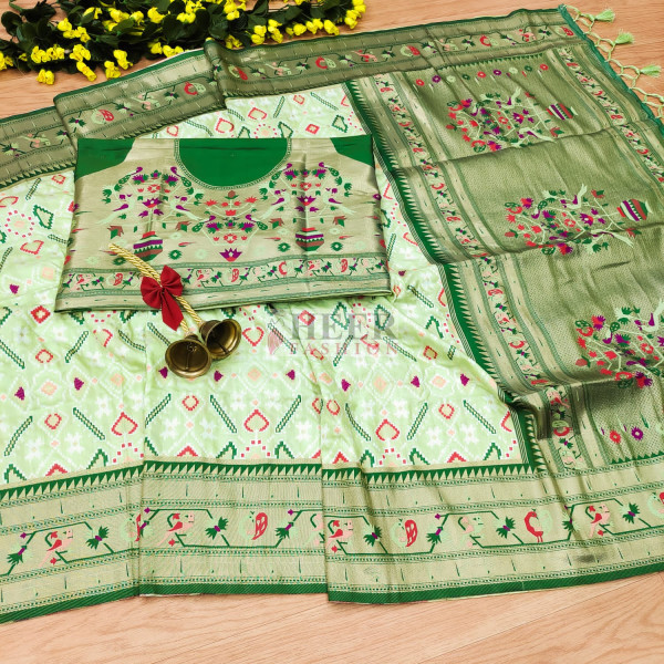 pista-green-color-patola-silk-saree-with-zari-weaving-work