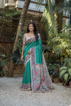 Rama green color tussar silk saree with madhubani printed work