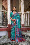 Rama green color soft tussar silk saree with ikkat printed work