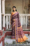 Coffee color soft tussar silk saree with ikkat printed work