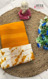 Yellow color soft plain georgette saree with shibori printed blouse