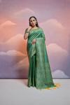 Pista green color handloom raw silk saree with contrast weaving work