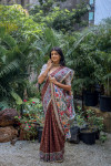Brown color tussar silk saree with madhubani printed work