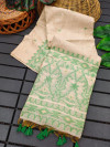 Off white and green color soft muga cotton saree with jamdani weaving work