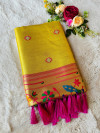 Yellow color soft tissue paithani silk saree with zari weaving work