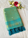 Rama green color soft tissue paithani silk saree with zari weaving work