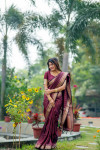 Dark maroon color soft banarasi raw silk saree with zari lining weaving work