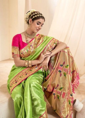 Pista green color soft tissue paithani silk saree with zari weaving work