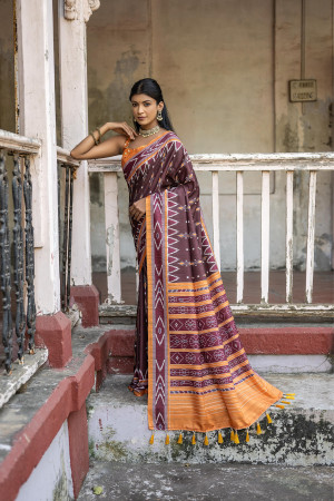Coffee color soft tussar silk saree with ikkat printed work