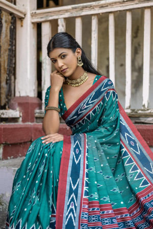 Rama green color soft tussar silk saree with ikkat printed work