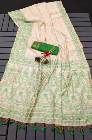 Off white and green color soft muga cotton saree with jamdani weaving work