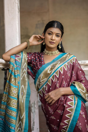 Maroon color soft tussar silk saree with ikkat printed work