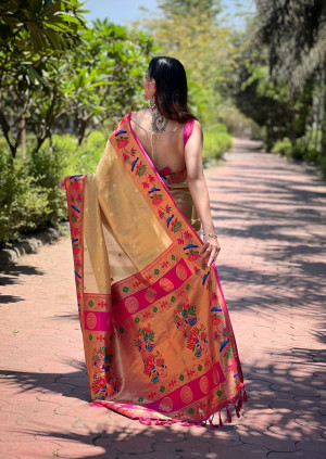 Beige color soft tissue paithani silk saree with zari weaving work