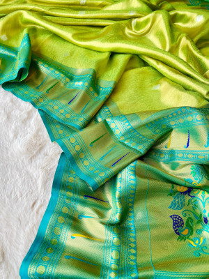 Parrot green color soft tissue paithani silk saree with zari weaving work