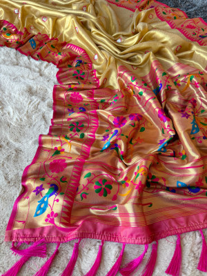 Cream color soft tissue paithani silk saree with zari weaving work
