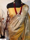 Yellow bordered Jute silk embroidered cut work saree