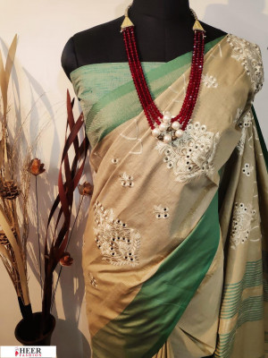 Green Bordered Jute silk embroidered cut work saree
