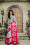 Pink and silver color tissue silk saree with zari weaving work