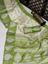 Green and off white color banarasi art silk saree with zari weaving work