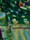 Green color soft banarasin silk saree with silver zari weaving work