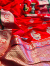 Red color soft banarasi silk saree with silver zari weaving work