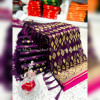 Magenta color banarasi silk saree with golden zari weaving work