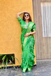 parrot green color pure bandhej silk saree with zari weaving border
