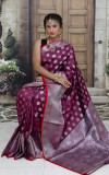Magenta color lichi silk saree with silver zari work
