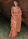 Peach color linen cotton saree with zari weaving border