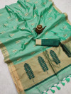Sea green color matalic linen saree with zari weaving border & gorgeous pallu