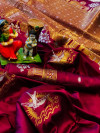 Magenta color soft lichi silk saree with attractive gold and silver zari weaving work