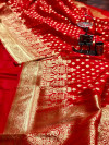 Red color banarasi soft silk saree with gold zari woven border