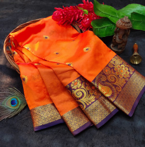 Orange color soft lichi silk saree with rich pallu