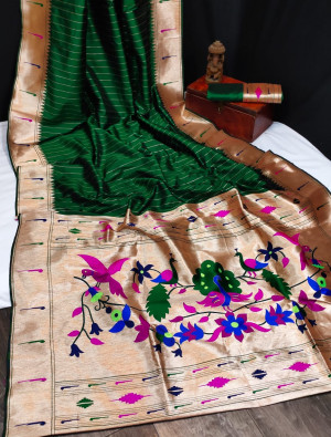 Green color paithani silk saree with zari weaving contrast work