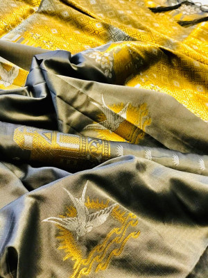 Gray color soft lichi silk saree with attractive gold and silver zari weaving work