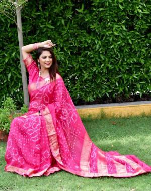 Rani pink color pure bandhej silk saree with zari weaving border