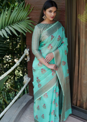 Sea green color linen cotton saree with zari weaving border