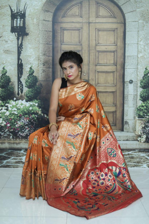 Orange color soft paithani silk saree with weaving rich pallu