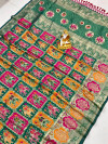 Rama green color soft patola silk saree with golden zari weaving work