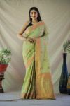 Pista green color tussar silk saree with golden zari weaving work
